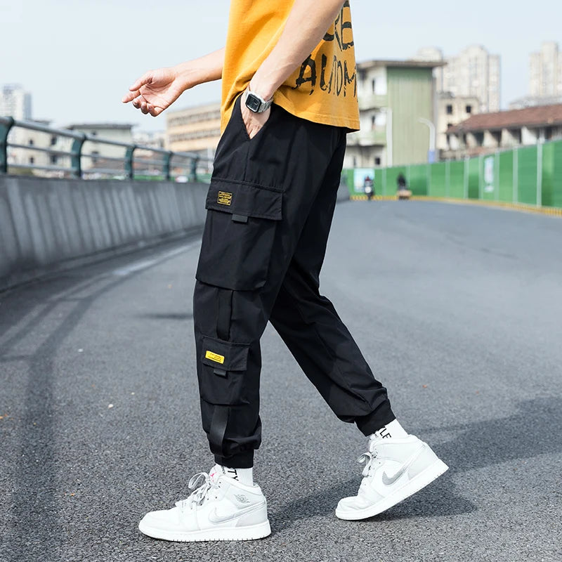 Pantalon cargo surdimensionné pour homme, streetwear, jogging noir, décontracté, taille élastique, sarouel, grande taille 5XL