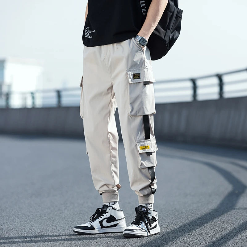 Pantalon cargo surdimensionné pour homme, streetwear, jogging noir, décontracté, taille élastique, sarouel, grande taille 5XL